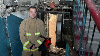 Dmytro Shevchenko, 30, inside a ruined apartment block in Sumy, northeast Ukraine. It was destroyed in March by a Shahed drone, killing four people