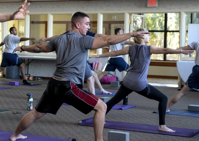 Service members gather for yoga